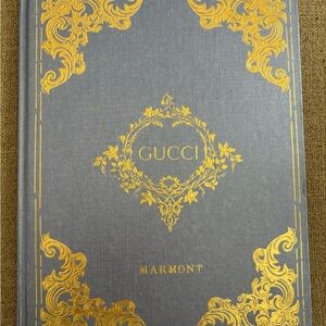 Gucci Marmont Collection Hardcover Book- hardcover damaged but Pages Intact